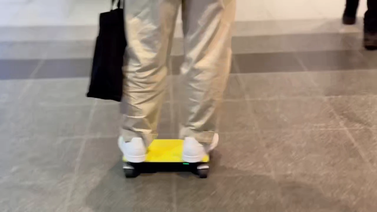 Japan has released a miniature electric board that looks like a laptop with wheels