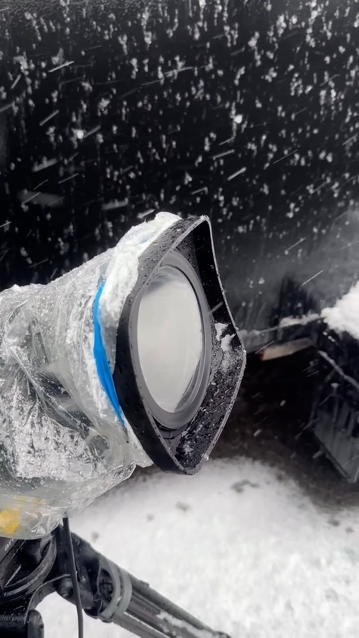 Centrifuge camera “wiper” that shakes off snow and raindrops