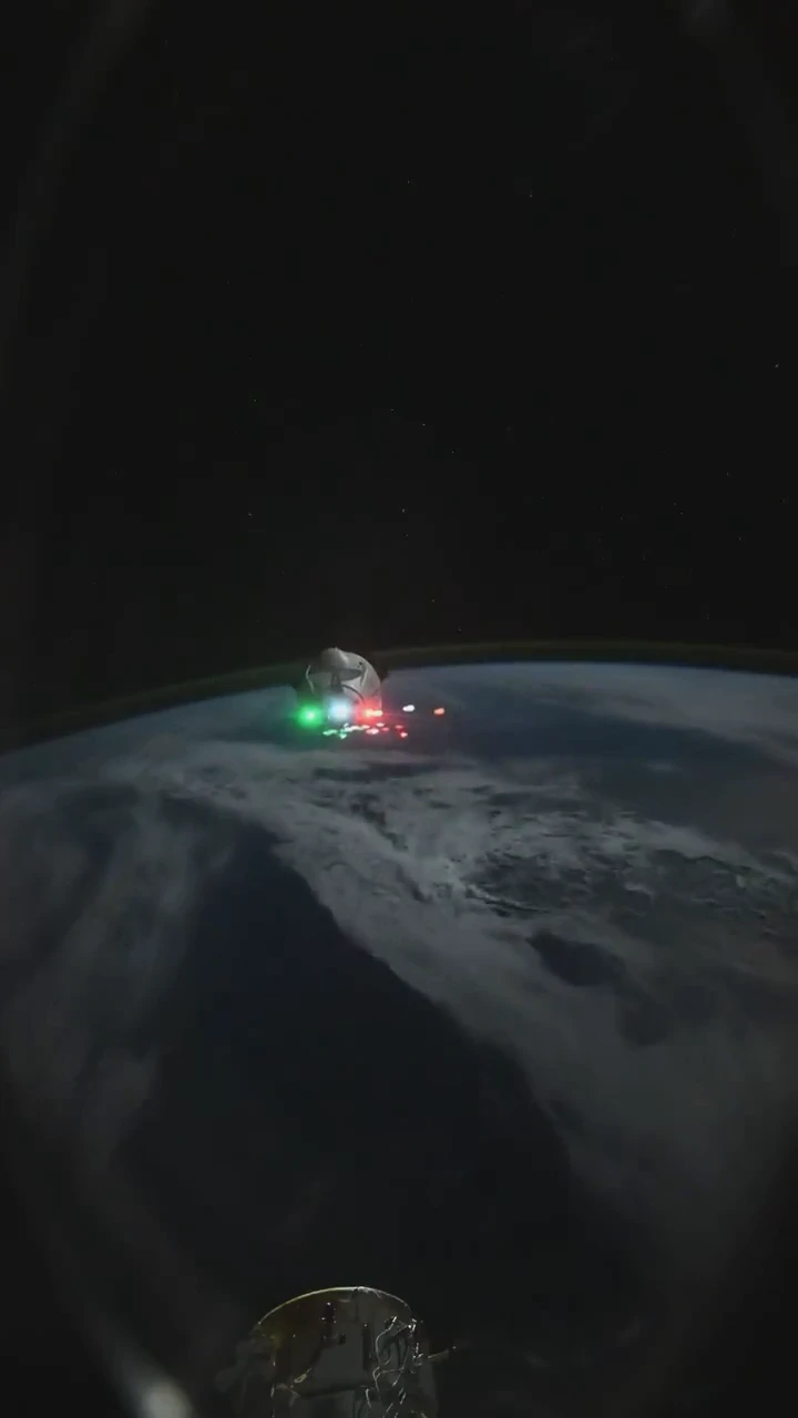 Porthole view of SpaceX spacecraft docking with the ISS