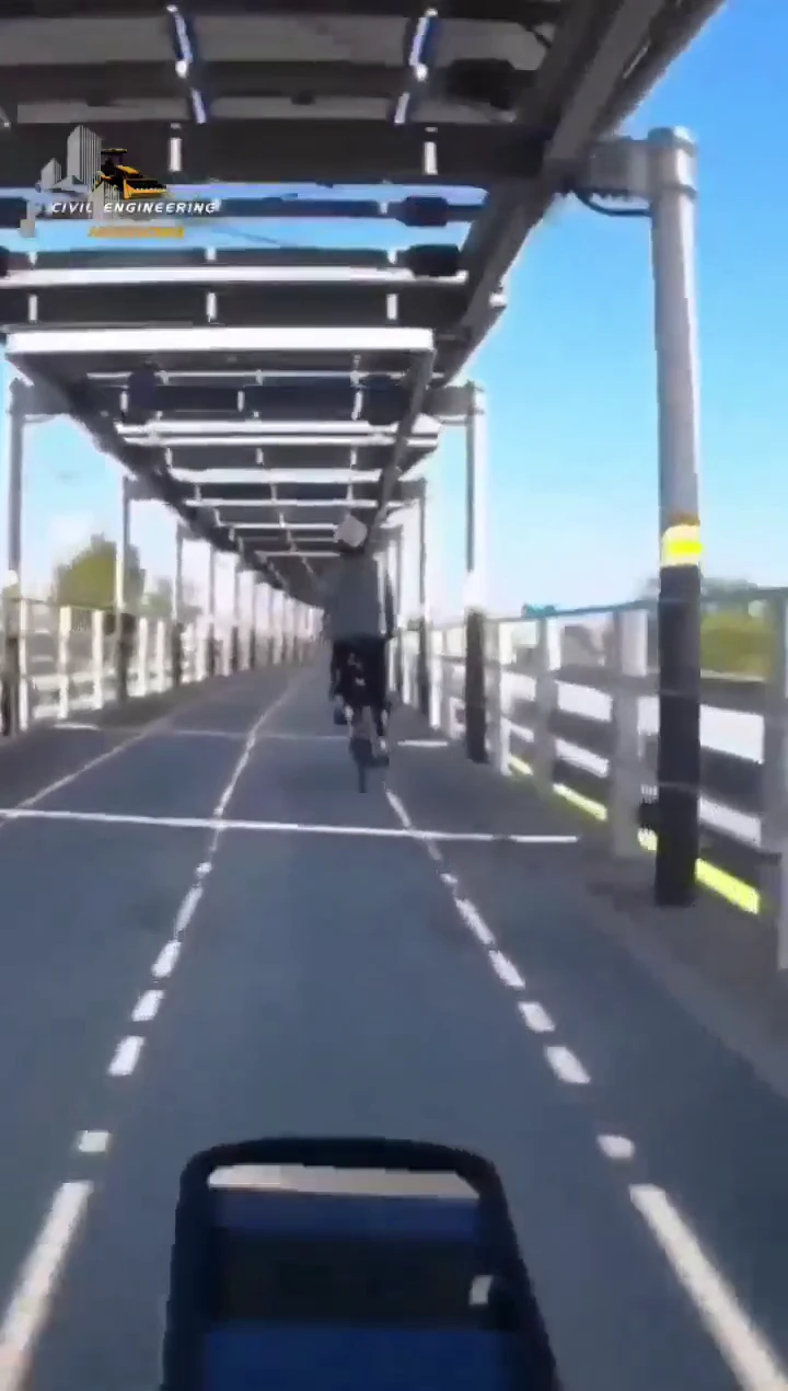 Highway that powers itself and protects cyclists