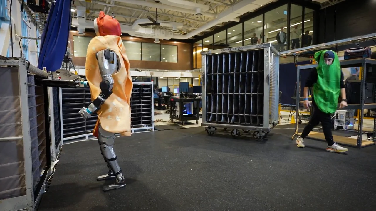 Why is it better to make human-like robots?  So they can fit the best Halloween costumes!