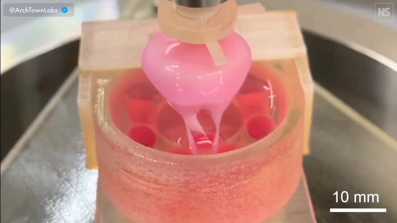 Smiling robot face created from living human skin cells